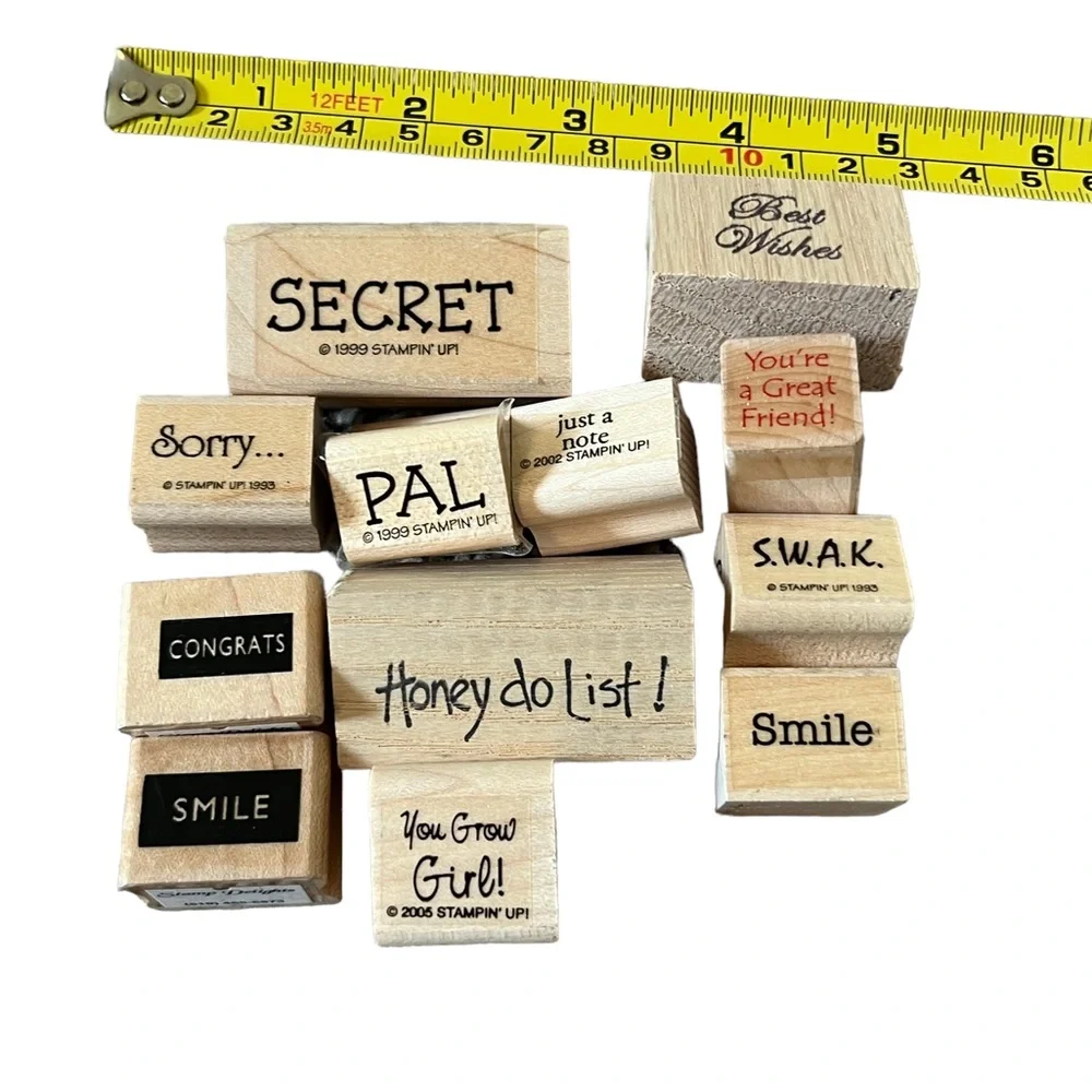 Lot of 12 mini word rubber stamps. Most of the stamps are brand new.